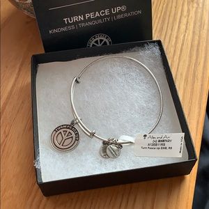 Alex and Ani “turn peace up” silver bracelet